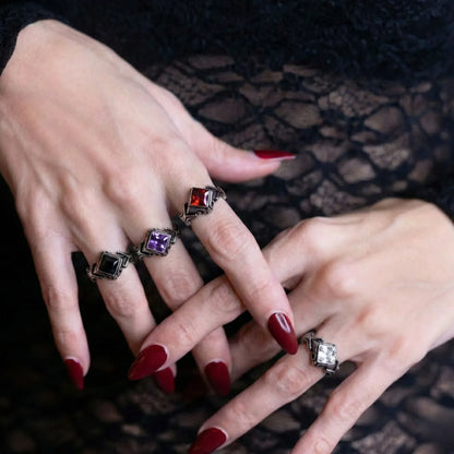 Gothic Princess Cut Crystal Ring Red Purple Black and White Worn by Female Model