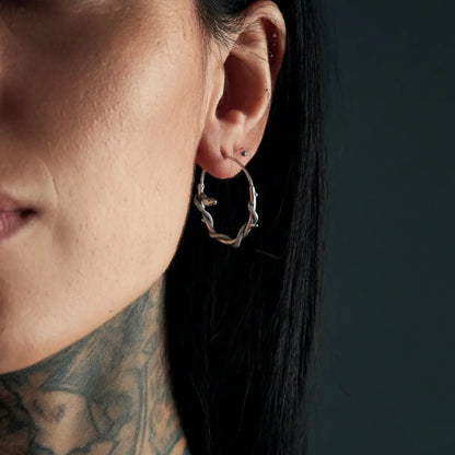 Gothic Snake Hoop Earrings Worn by Female Model Close Up