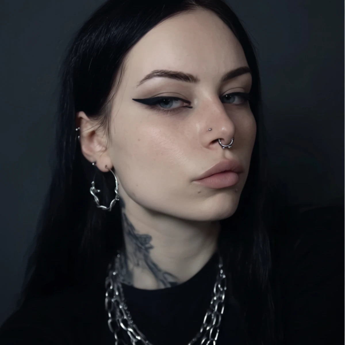 Gothic Snake Hoop Earrings Worn by Female Model