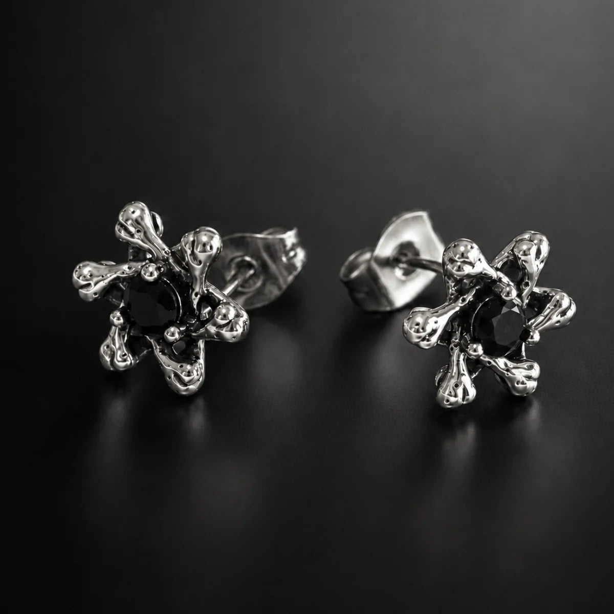 Gothic Star Stud Earrings Close Up Black Background