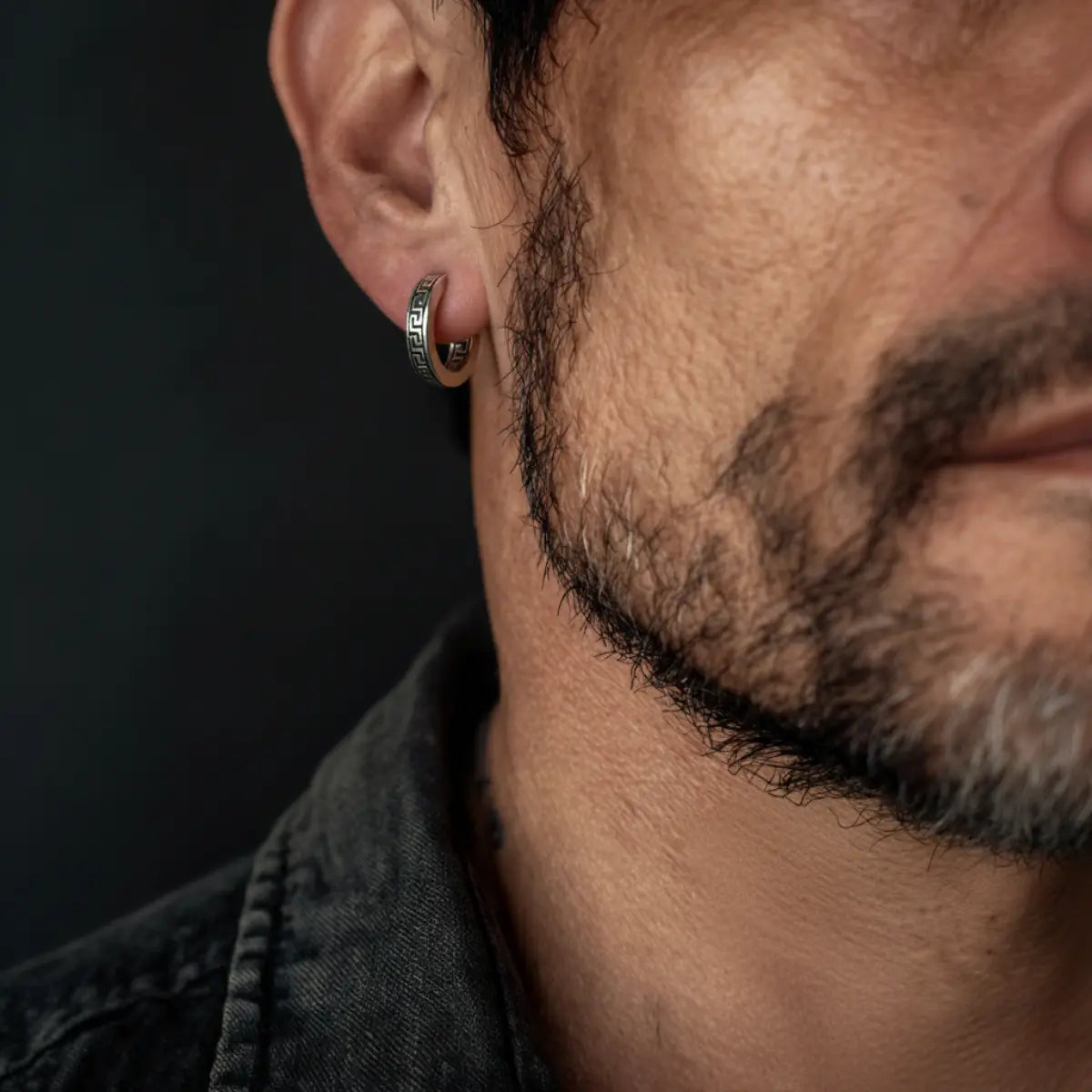 Greek Key Hoop Earrings Silver Worn by Male Model Close Up