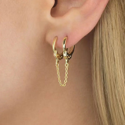 Handcuff Drop Earrings Gold Worn By Female Model