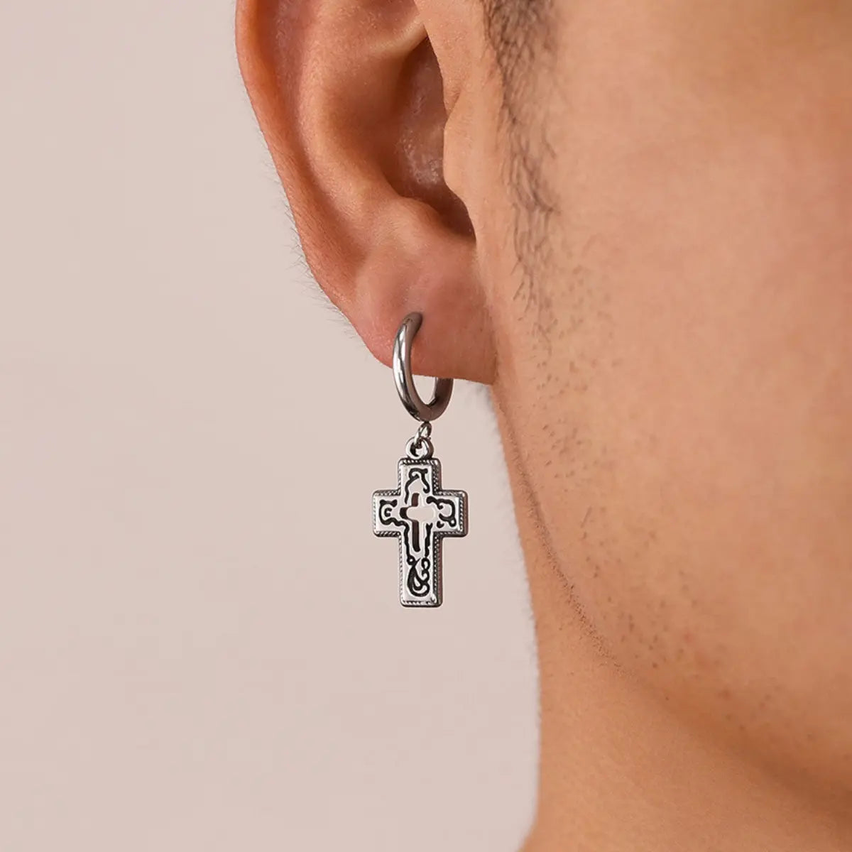 Hollow Cross Dangle Hoop Earrings Worn by Male Model Front