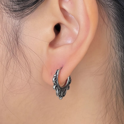 Hollow Scrollwork Hoop Earrings Worn by Female Model Close Up
