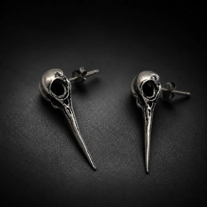 Hummingbird Skull Earrings Silver Pair Displayed Black Background