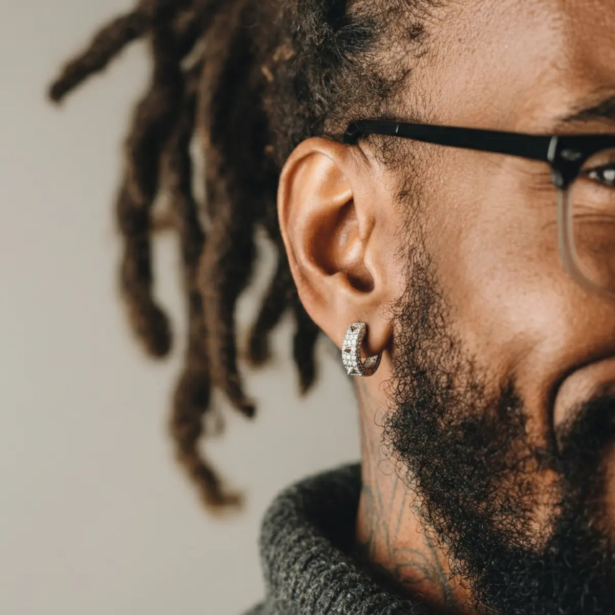 Iced Out Spikelet Hoop Earrings White Gold Worn by Male Model Front