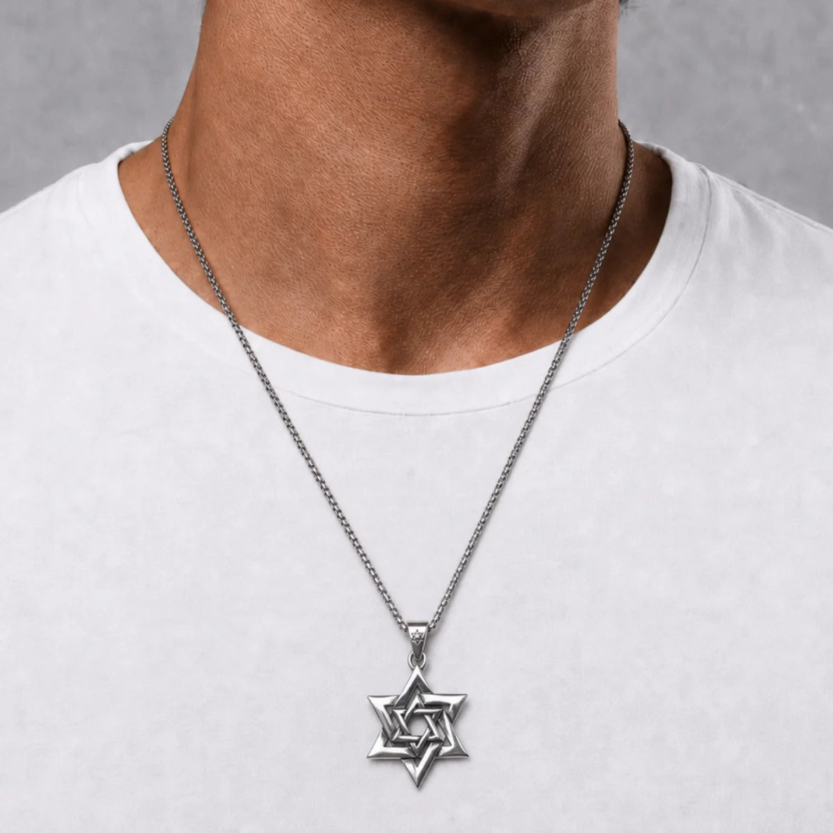 Interlocking Star of David Necklace Silver Worn by Male Model Chest View