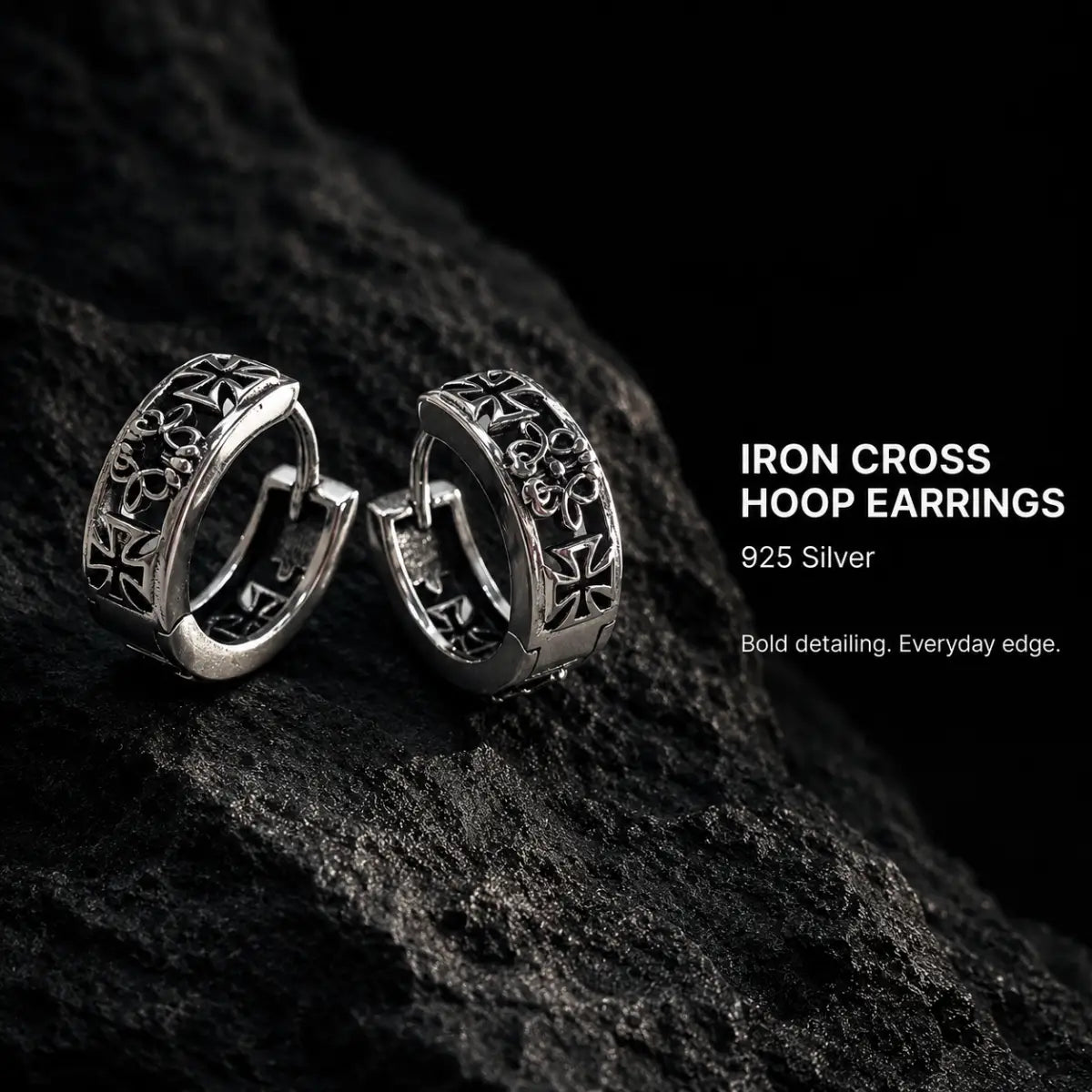 Iron Cross Hoop Earrings Silver Pair Displayed on Stone Surface