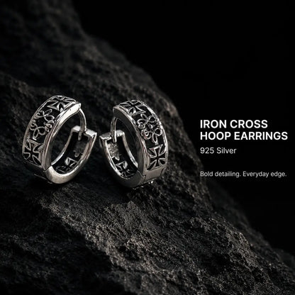Iron Cross Hoop Earrings Silver Pair Displayed on Stone Surface