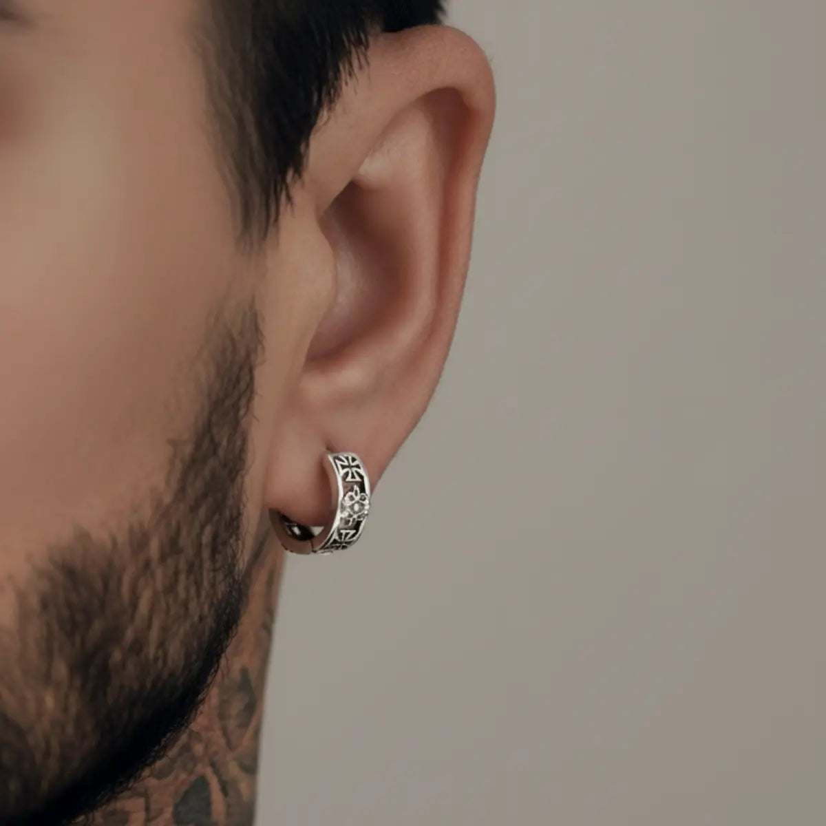 Iron Cross Hoop Earrings Worn by Male Model