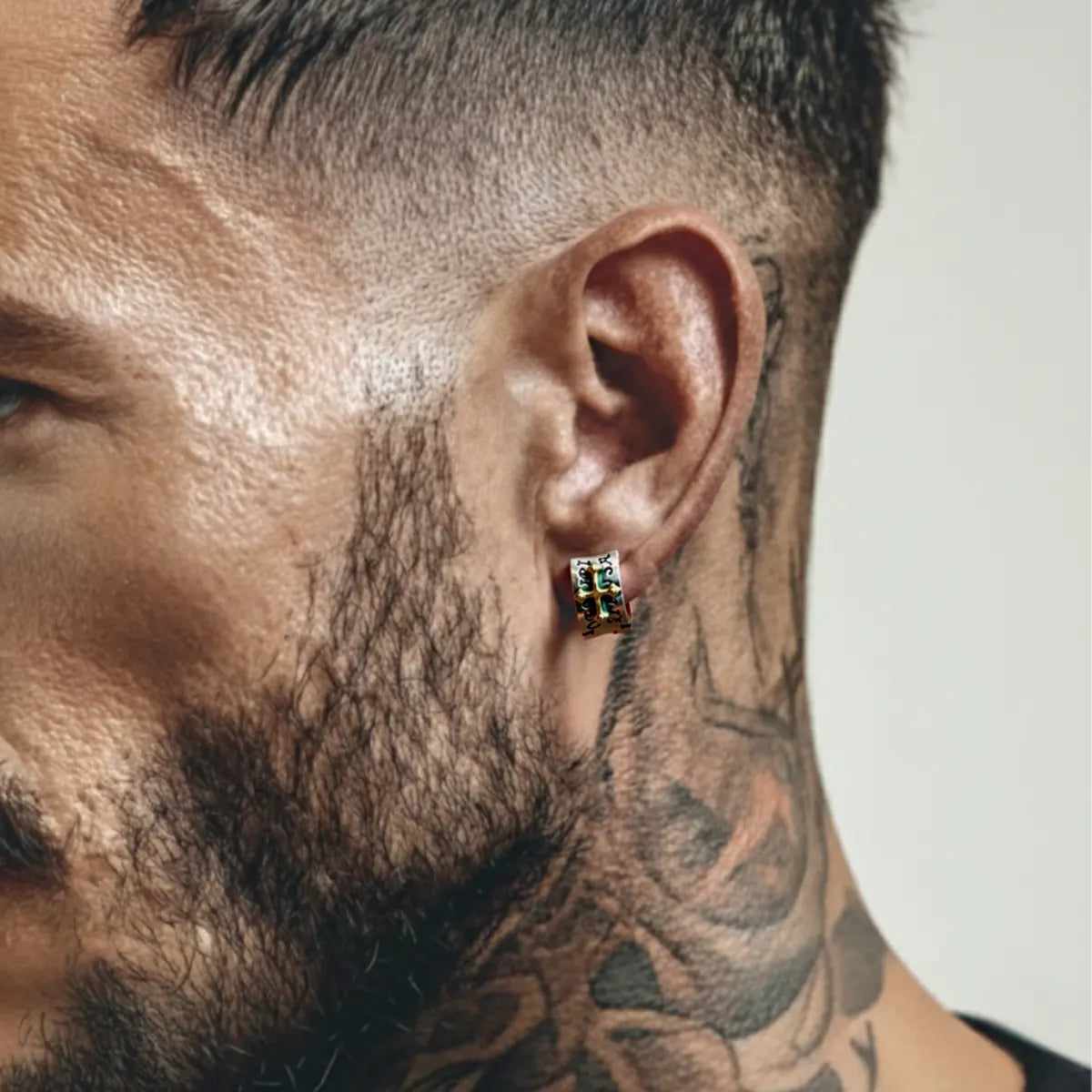 Letter Cross Huggie Hoop Earrings Worn by Male Model