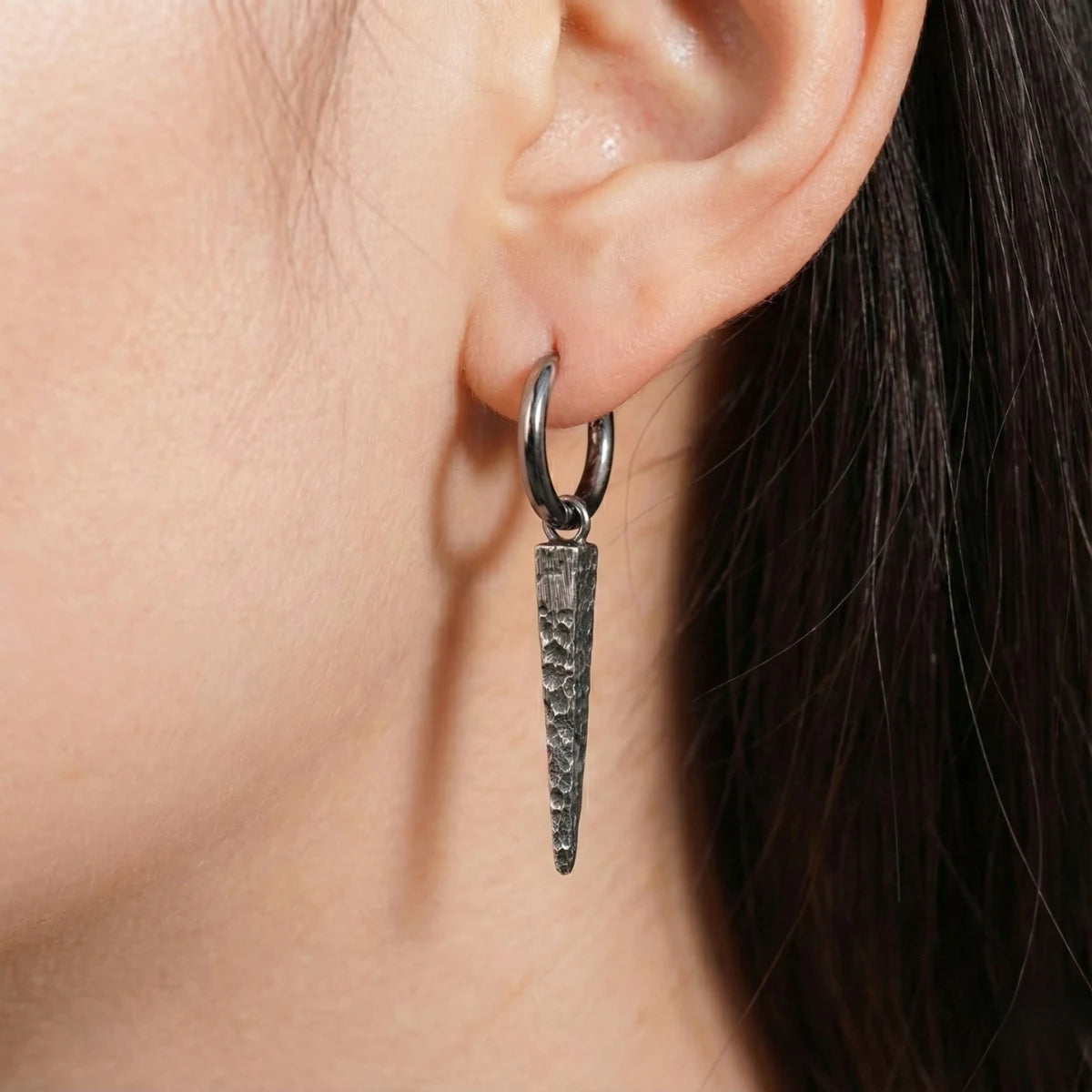 Long Spike Dangle Hoops Worn by Female Model