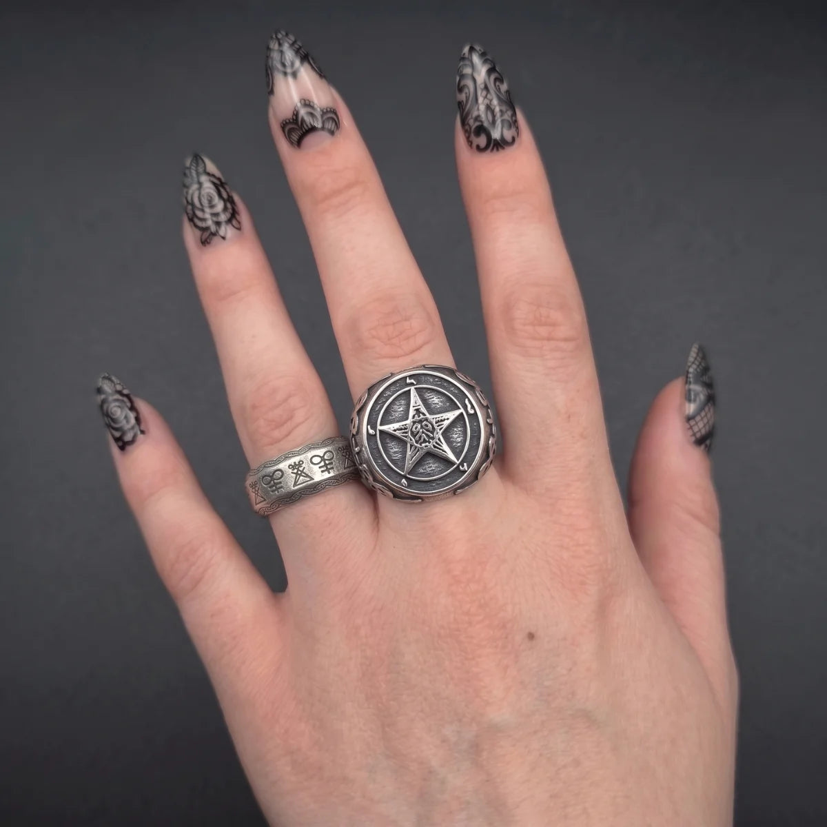 Lucifer Sigil Band Ring and Pentagram Baphomet Ring Silver Worn by Female Model