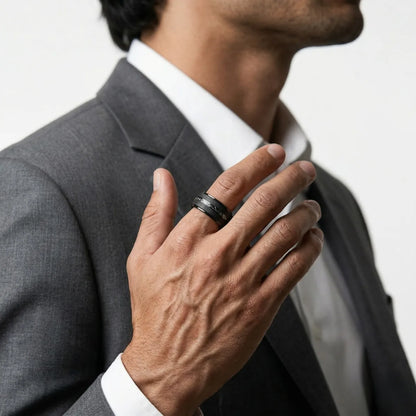 Medium shot of male model in casual clothing wearing the Black Meteorite Tungsten Ring