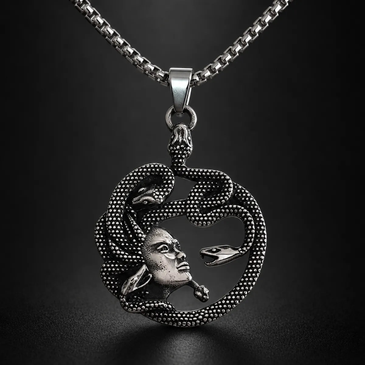 Medusa Snake Necklace Pendant Displayed Black Background