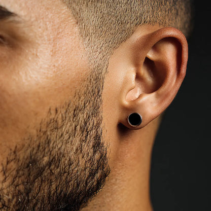 Men's Black Stud Earrings Stainless Steel Worn by Male Model Close Up