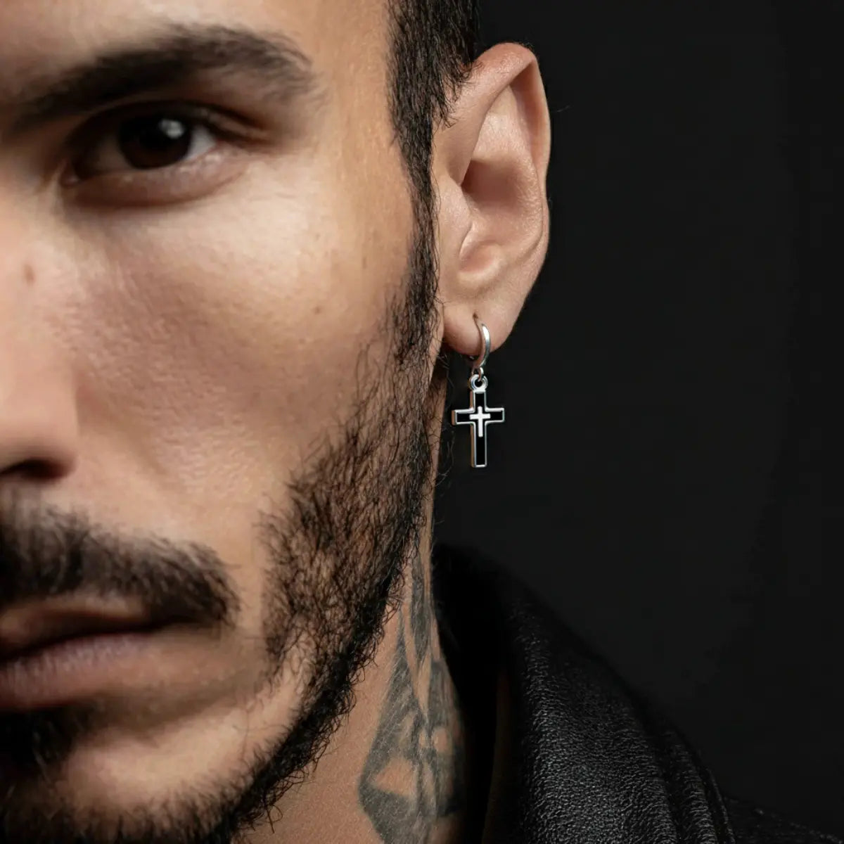 Men's Cross Dangle Earrings Worn by Male Model Close Up