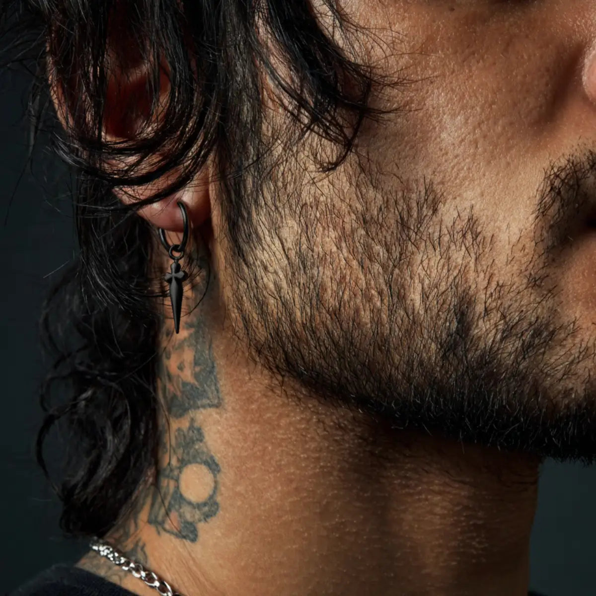 Men's Dagger Earrings Black Worn by Male Model
