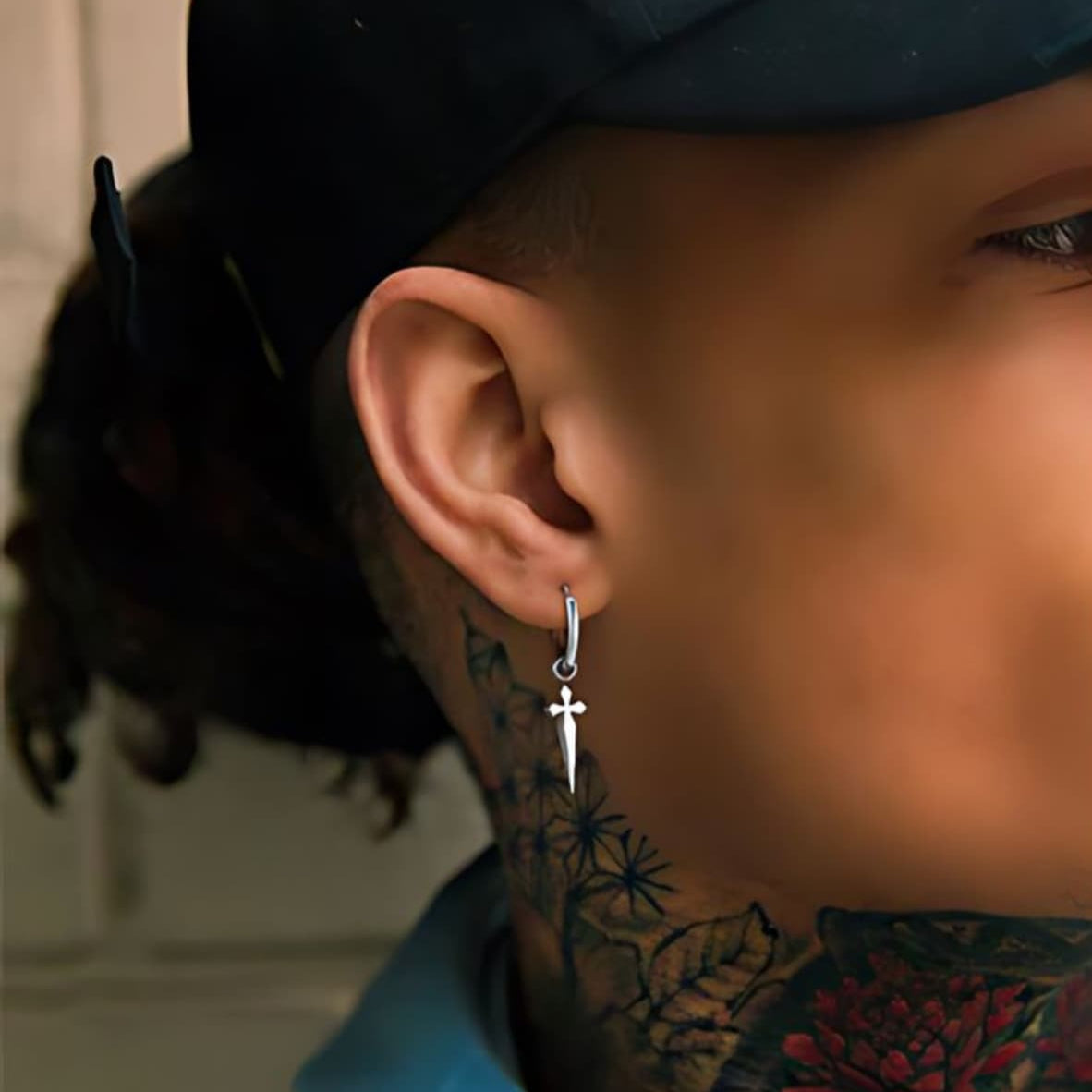 Men’s Dagger Earrings Silver Worn by Model - Xenos Jewelry