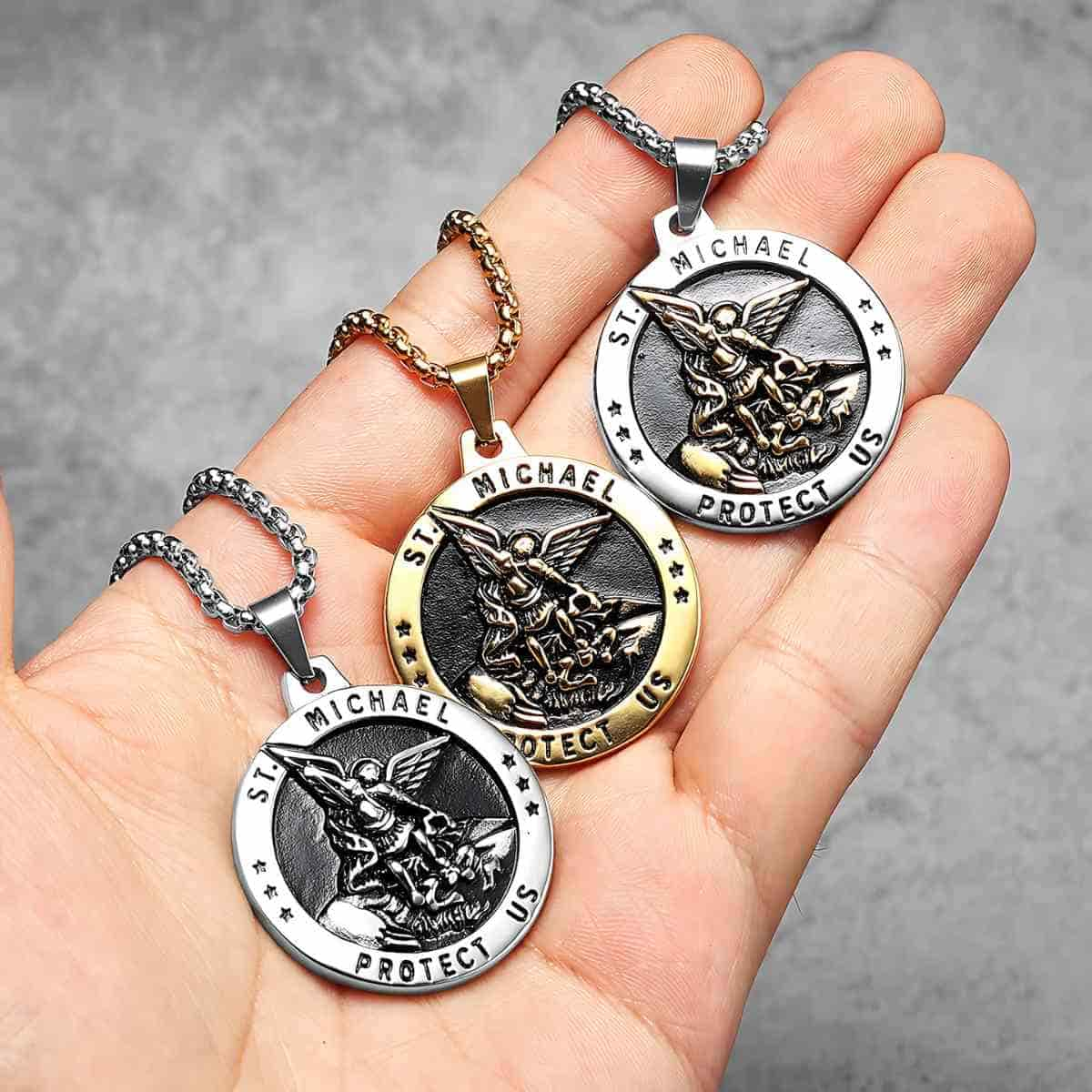 Mens St Michael Pendant Necklace All Variants Held in Hand Xenos Jewelry