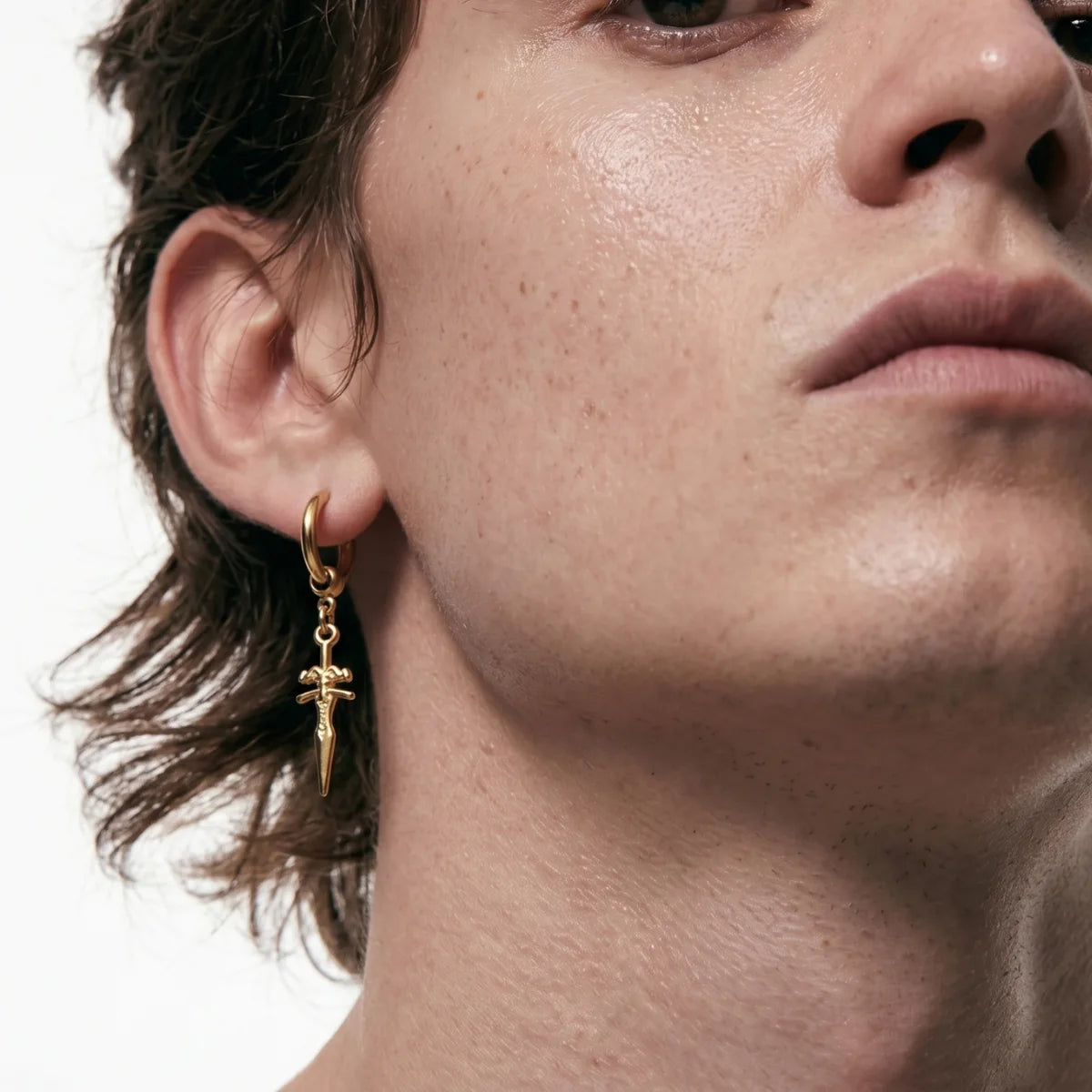 Men’s Sword Earrings Gold Worn by Male Model