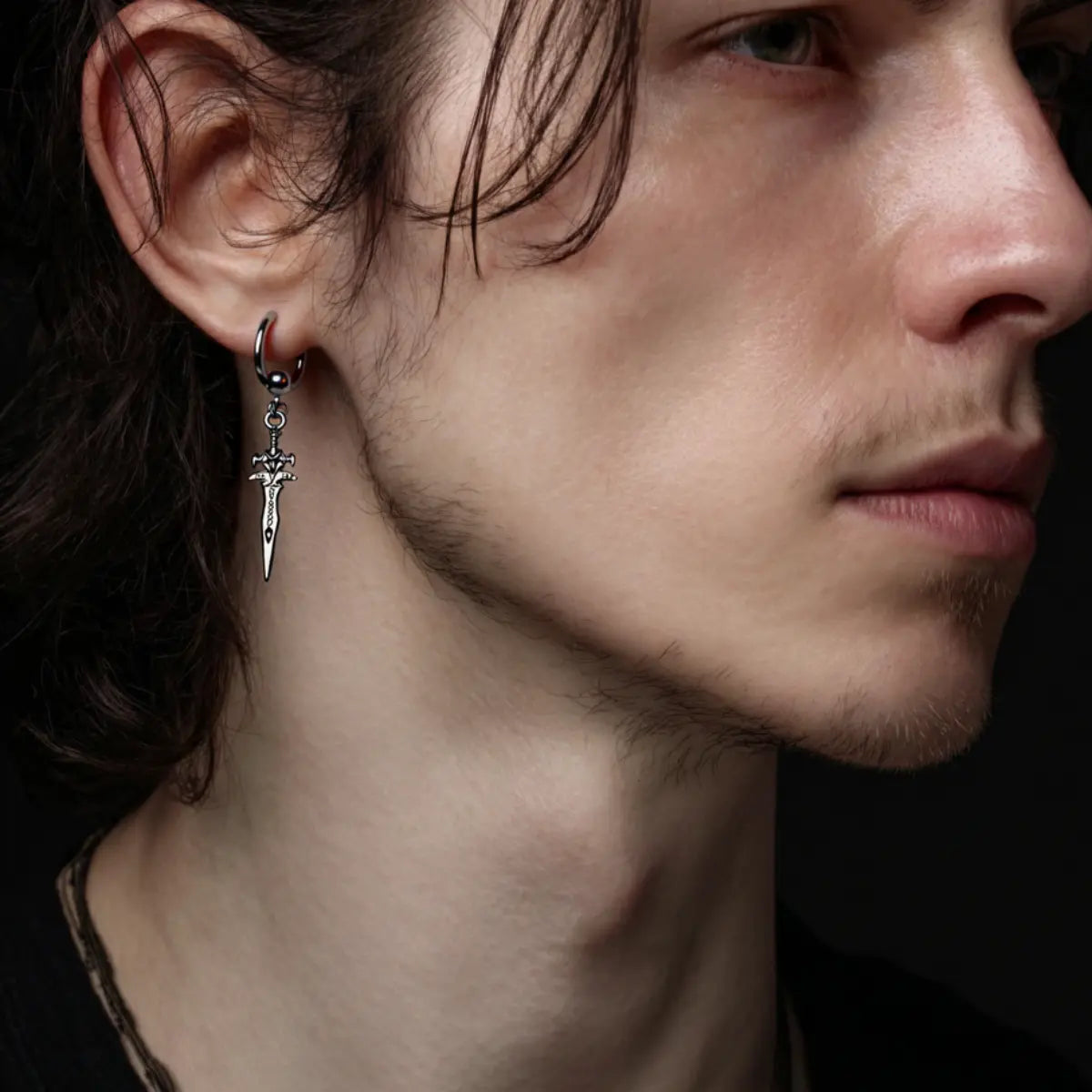 Men's Sword Earrings Worn by Male Model