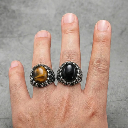 Men‘s Tiger Eye Skull Signet Ring and Black Onyx Skull Signet Ring Worn by Male Model