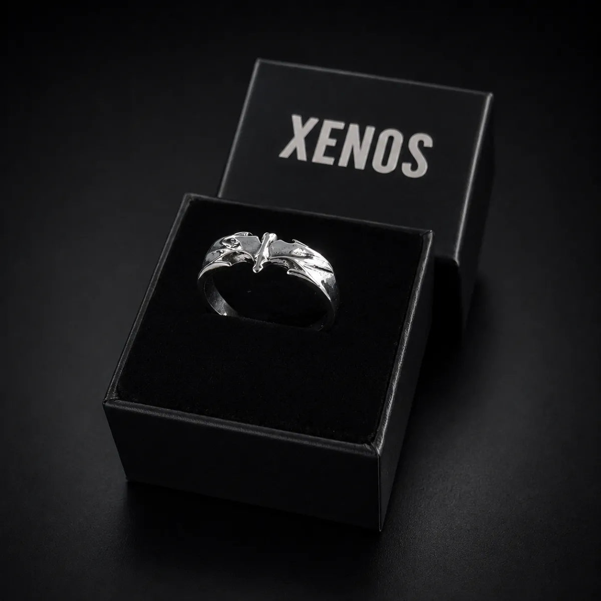 Minimalist Bat Ring Silver Displayed in Xenos Jewelry Box
