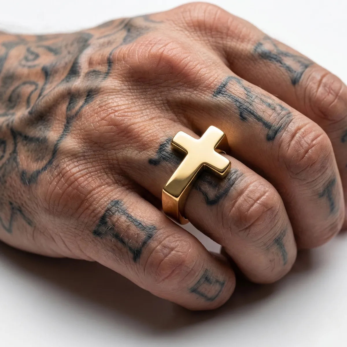 Minimalist Solid Cross Ring Gold Worn by Male Model Close Up
