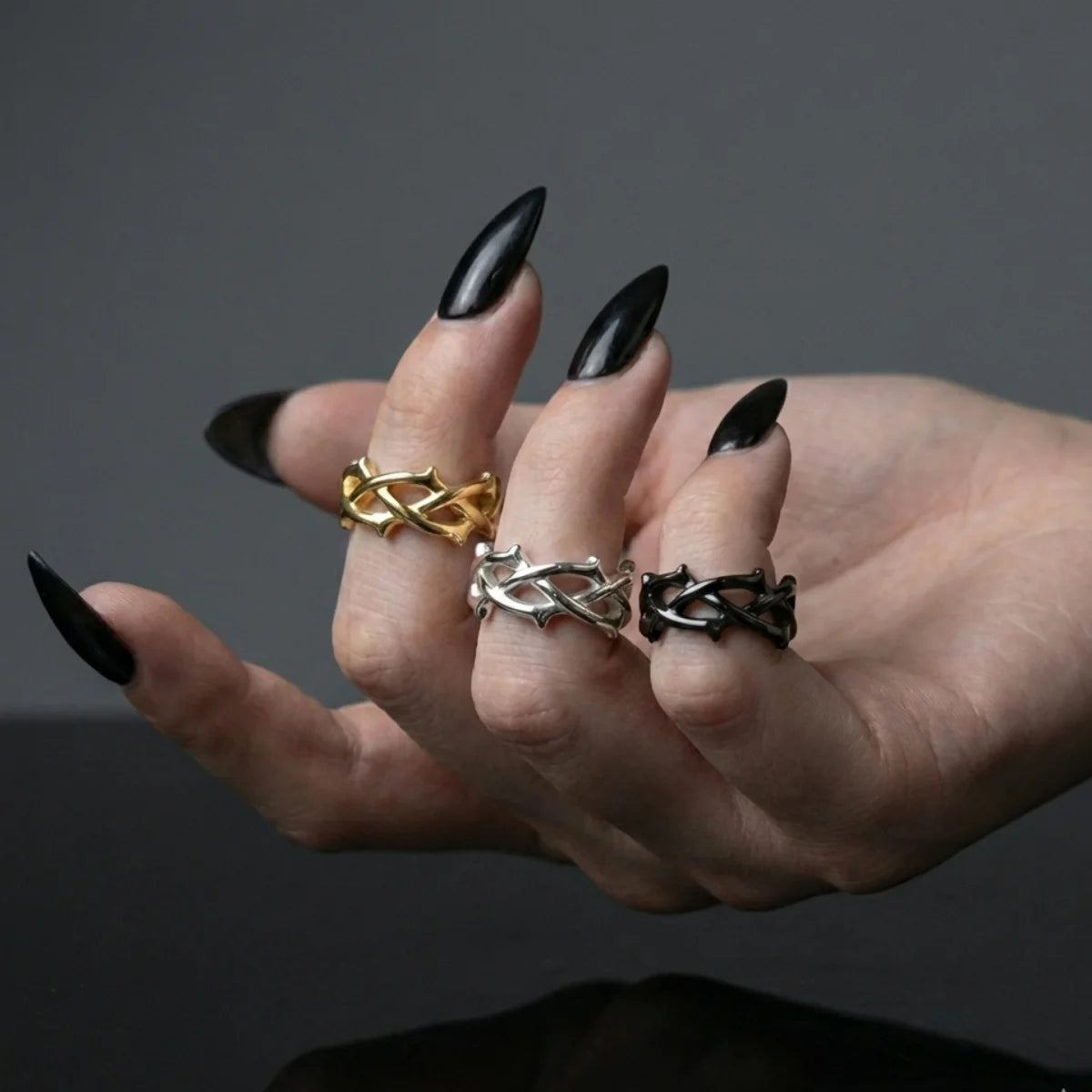 Minimalist Thorns Rings Silver Gold and Black Worn by Female Model