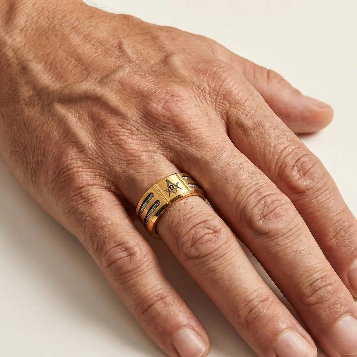 Modern Masonic Wedding Band Gold Worn by Male Model Close Up