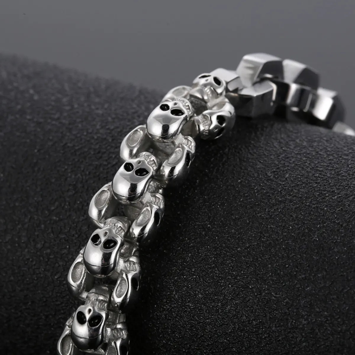 Multi Skull Block Bracelet Silver Detail Close Up Black Background