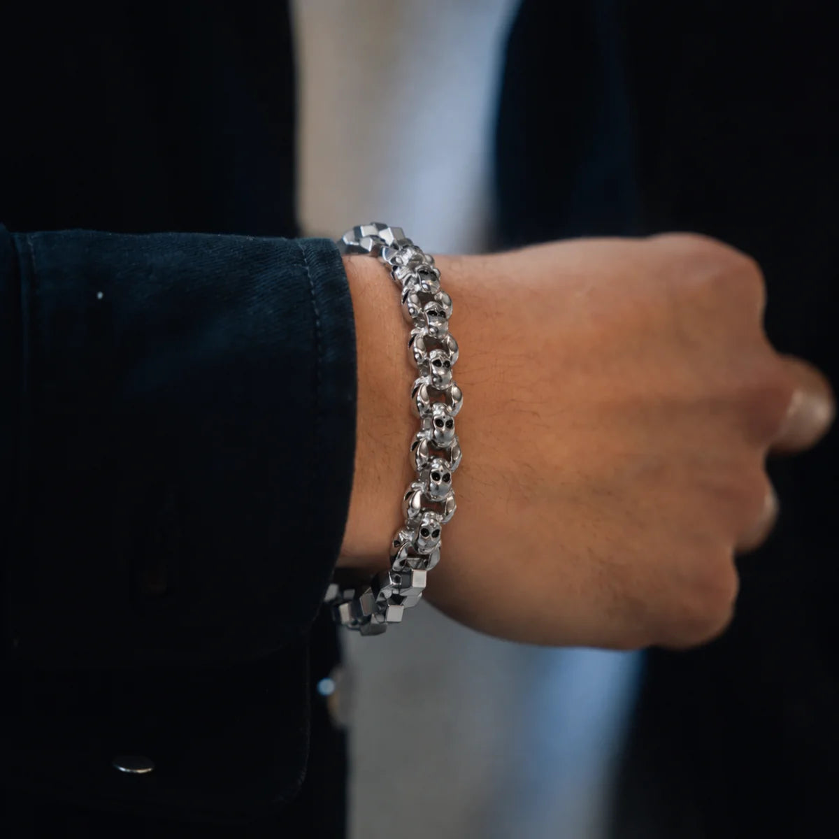 Multi Skull Block Bracelet Silver Worn on Hand Close Up