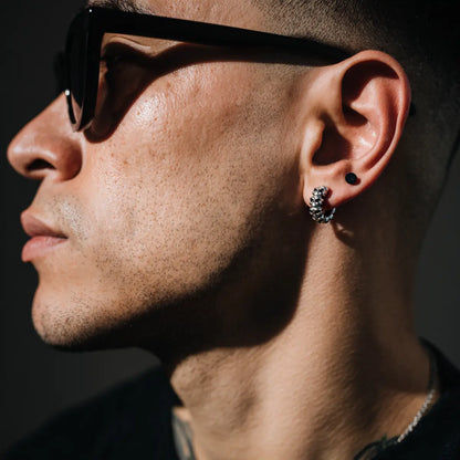 Multi Skull Huggie Hoop Earrings Worn by Male Model Side