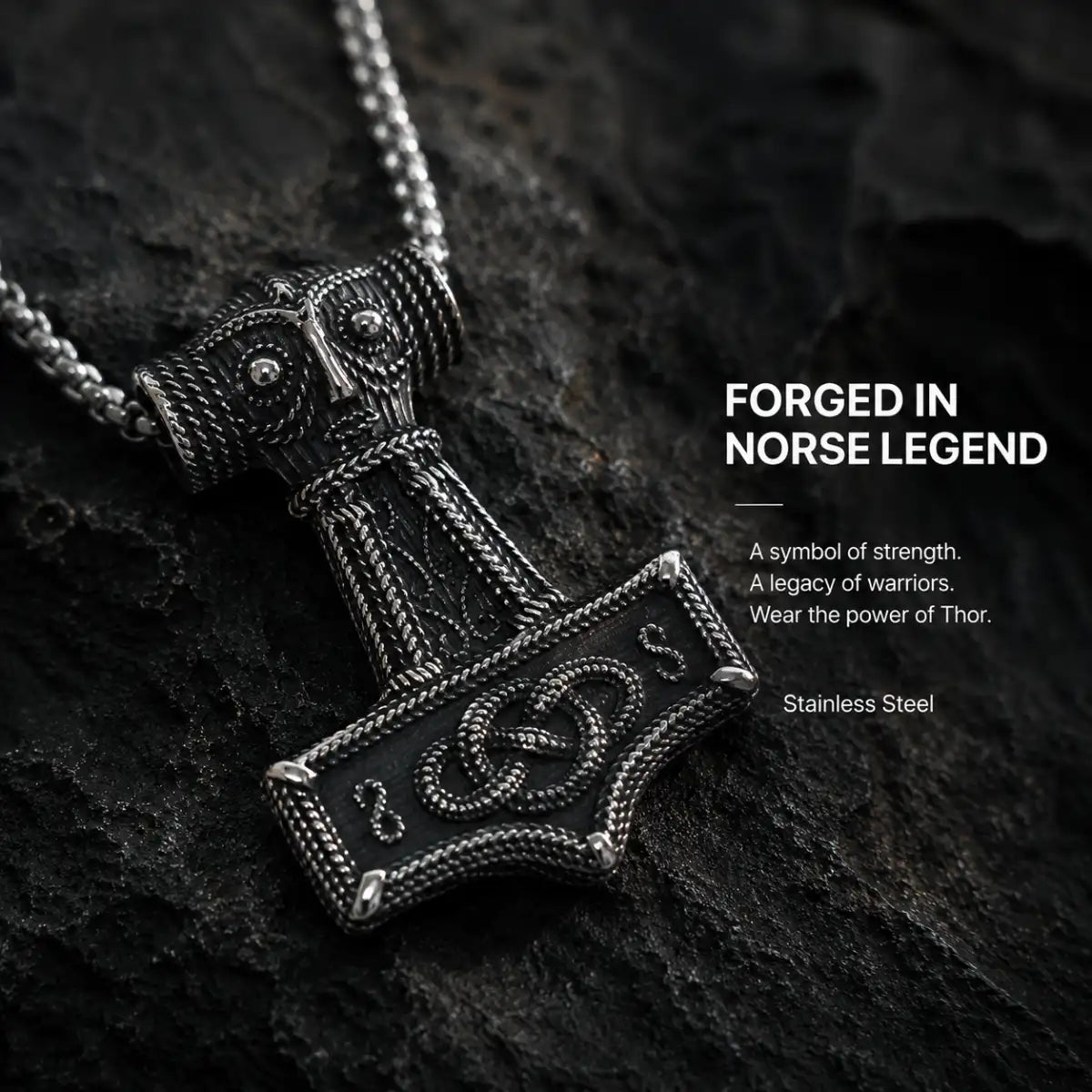 Norse Thor Hammer Pendant Necklace Silver Displayed on Stone Surface