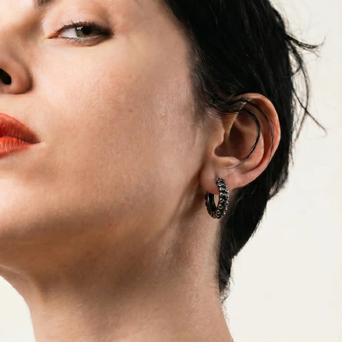 Octopus Tentacle Hoop Earrings Worn by Female Model Side View