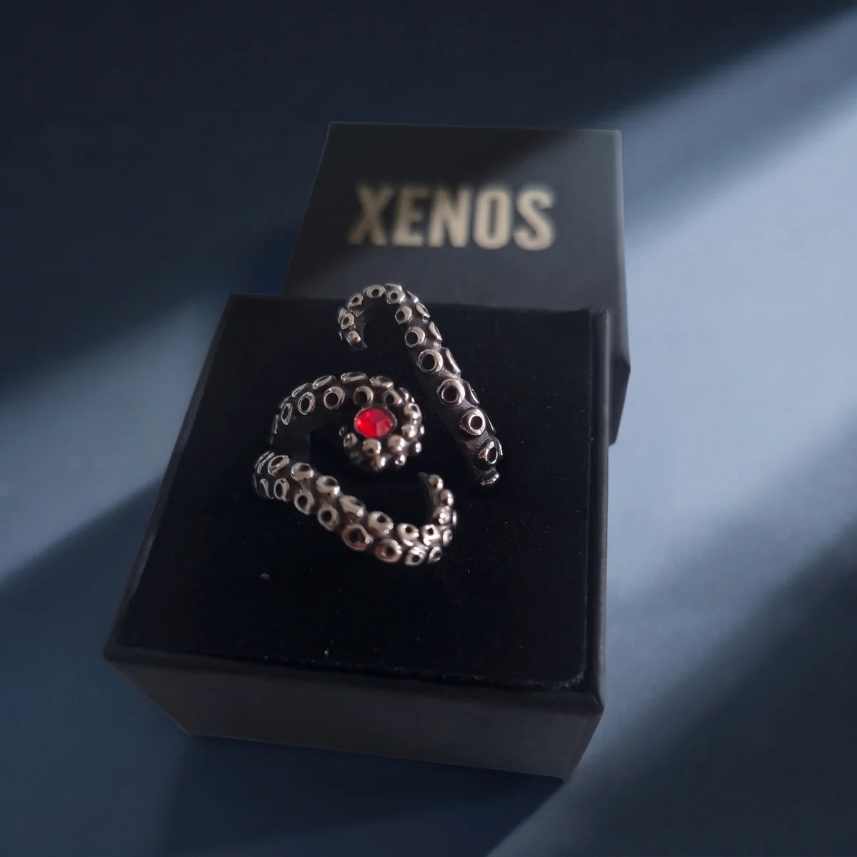 Octopus Tentacle Ring Silver with Red Stone Presented in Xenos Jewelry Packaging Box