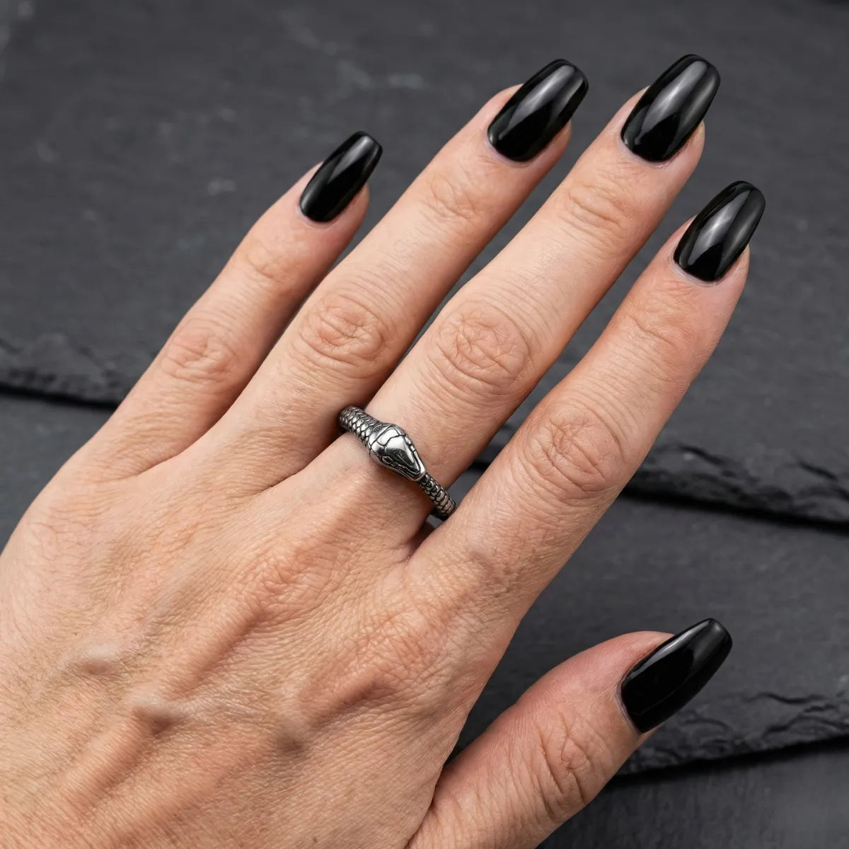 Ouroboros Ring Worn by Female Model