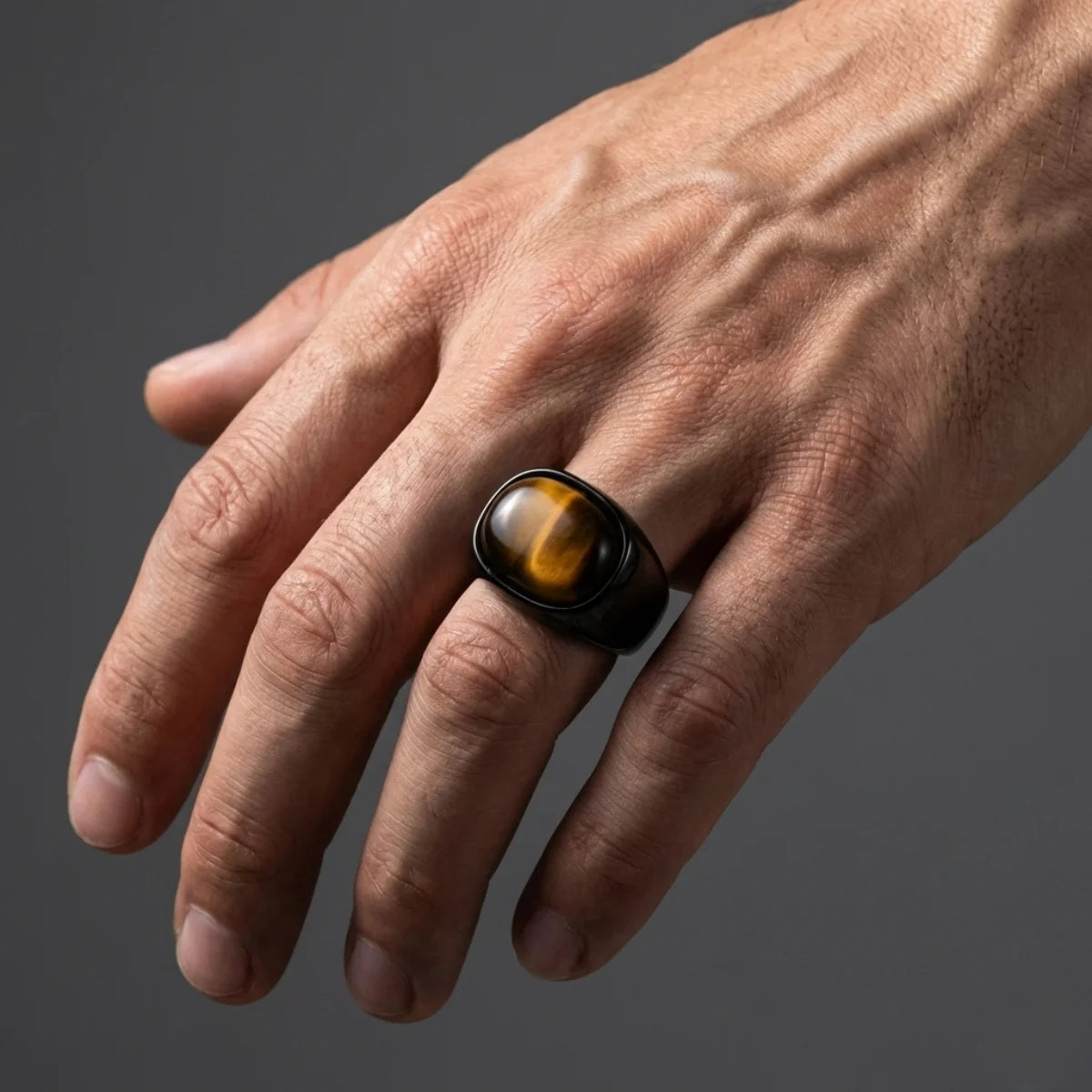 Oval Black Tiger's Eye Ring Worn by Male Model Close Up