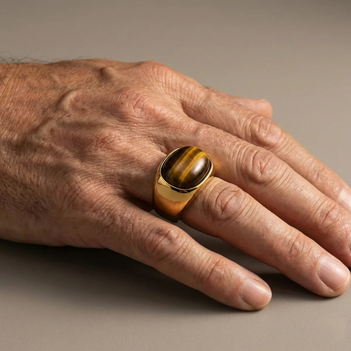 Oval Gold Tiger's Eye Ring Worn by Male Model Close Up