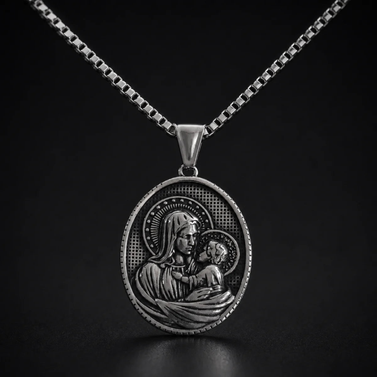 Oval Mother Mary and Child Necklace Silver Close Up Black Background