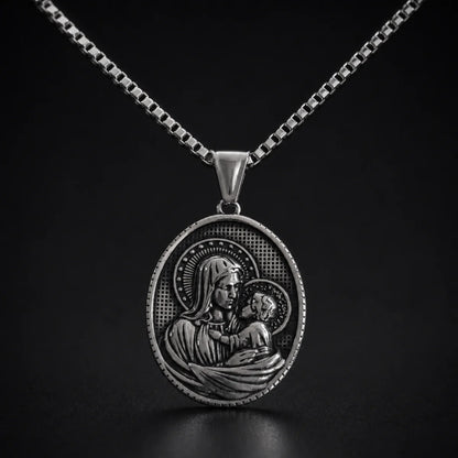 Oval Mother Mary and Child Necklace Silver Close Up Black Background