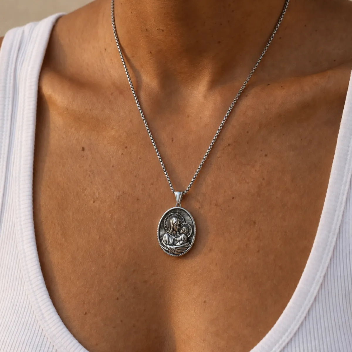 Oval Mother Mary and Child Necklace Silver Worn by Model
