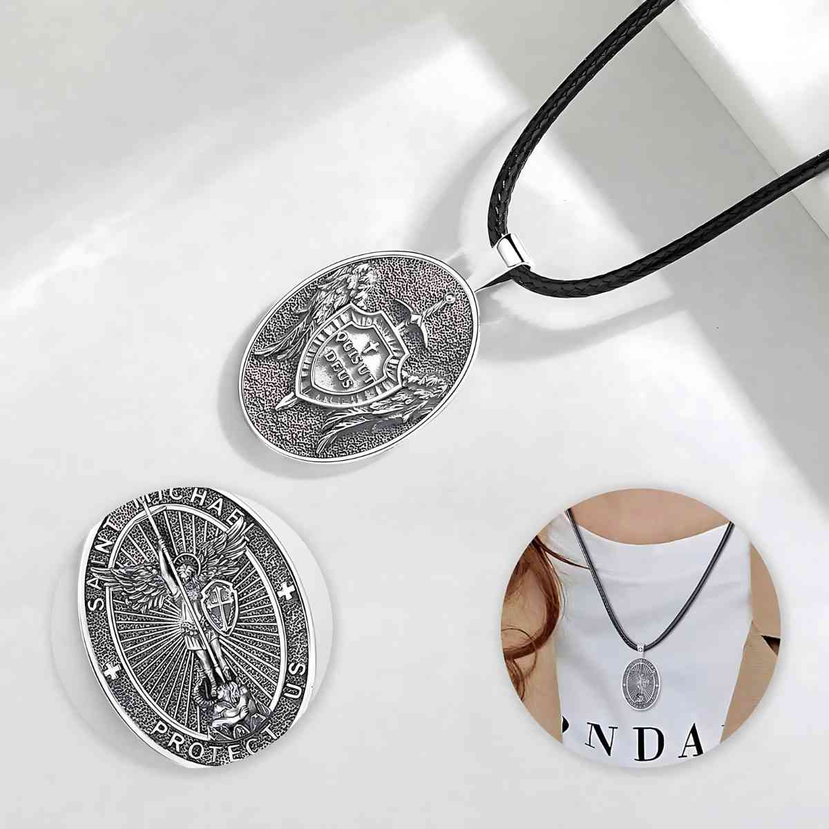 Oval St Michael Archangel Shield Medallion Displayed on White Surface Xenos Jewelry