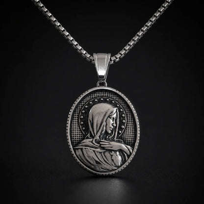 Oval Virgin Mary Necklace with Stars Silver Close Up Black Background