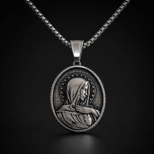 Oval Virgin Mary Necklace with Stars Silver Close Up Black Background
