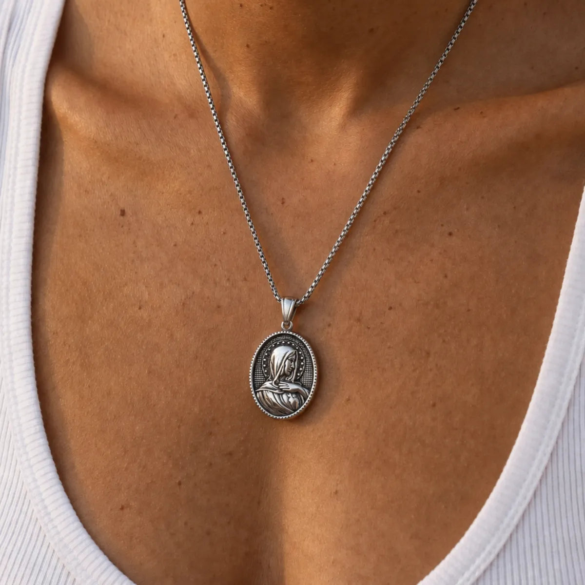 Oval Virgin Mary Necklace with Stars Silver Worn by Model