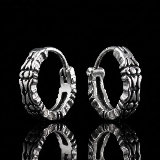 Oxidized Carved Hoop Earrings Silver Close Up Black Background
