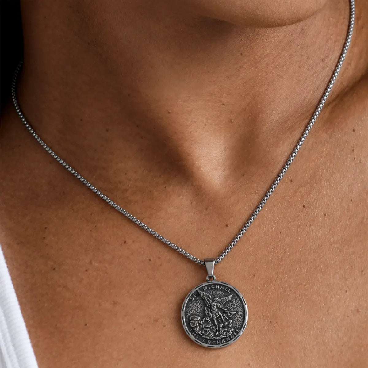 Oxidized St Michael Medallion Necklace Silver Worn by Model Close Up
