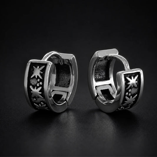 Oxidized Star Hoop Earrings Silver Pair Close Up Black Background